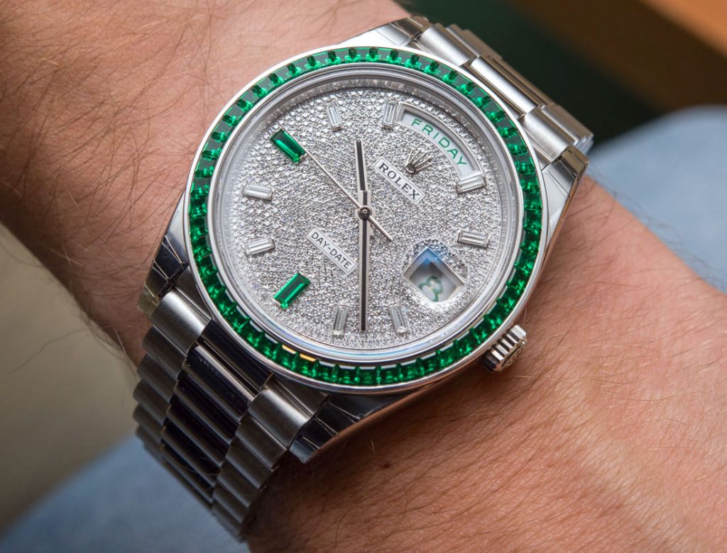 The diamonds paved dial endows the Rolex copy watch more eye-catching.